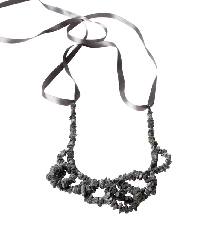 Granite necklace by Hanna Ryynänen on white background