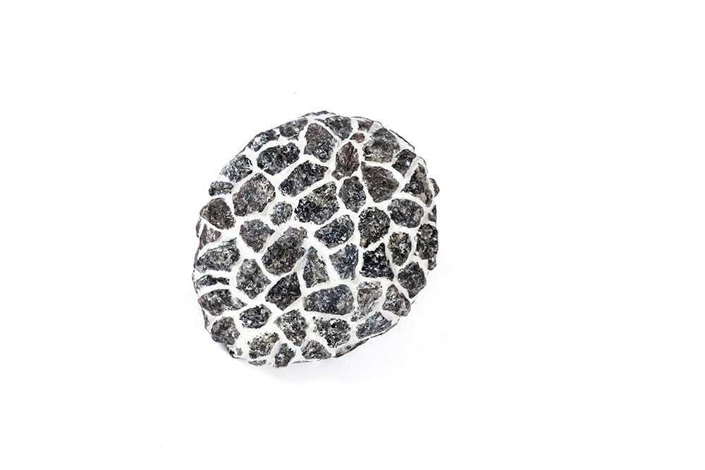 Small granite brooch by Hanna Ryynänen
